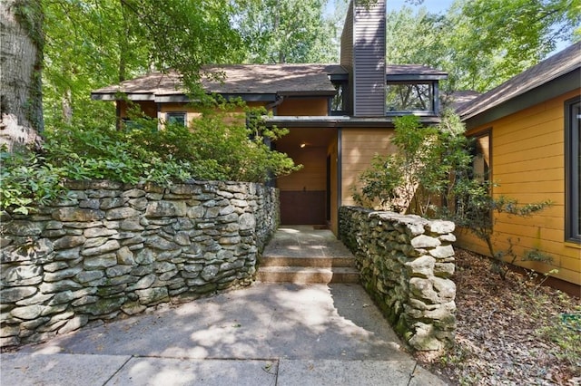 711 Oak Knoll Cir, Auburn, AL 36830 - entrance to property with a chimney