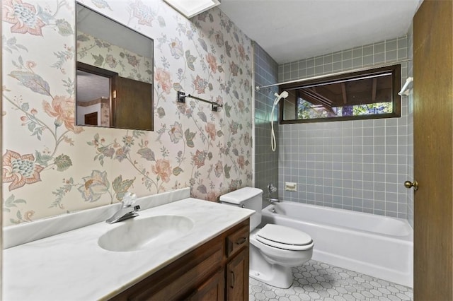 711 Oak Knoll Cir, Auburn, AL 36830 - bathroom featuring vanity, tub / shower combination, wallpapered walls, and tile patterned floors