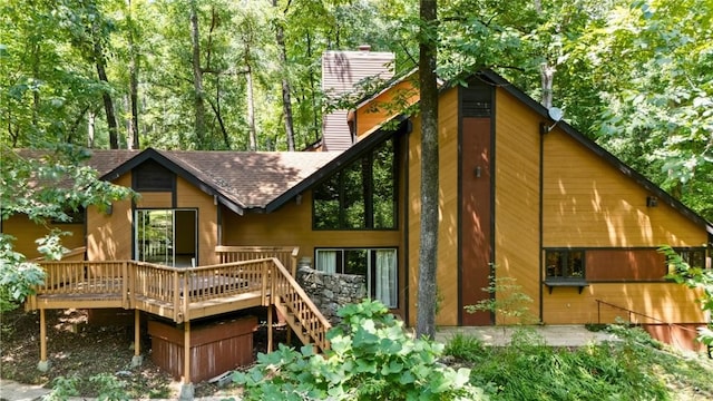 711 Oak Knoll Cir, Auburn, AL 36830 - rear view of house with a deck, a chimney, stairs, and a shingled roof