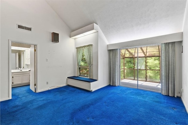 711 Oak Knoll Cir, Auburn, AL 36830 - unfurnished bedroom featuring carpet flooring, access to outside, high vaulted ceiling, and ensuite bath