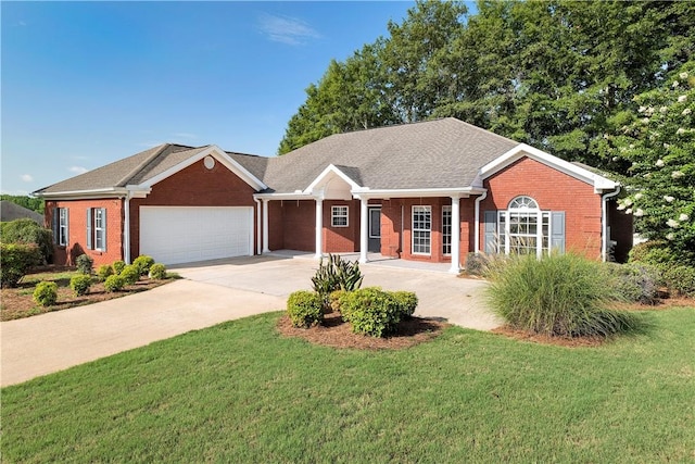 ranch-style home with covered porch, a garage, and a front lawn