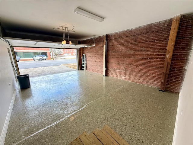 garage featuring baseboards