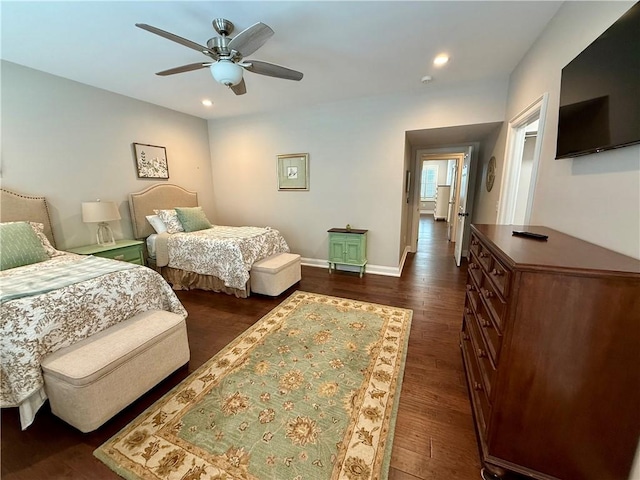 bedroom with dark wood-style floors, recessed lighting, ceiling fan, and baseboards