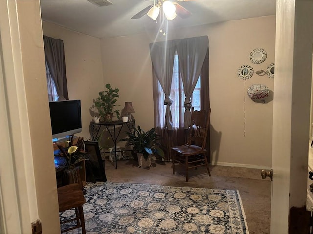 office area with carpet flooring and ceiling fan