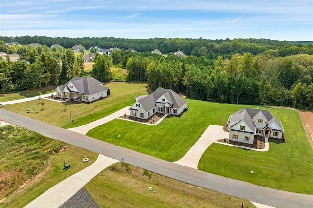 aerial view featuring a view of trees