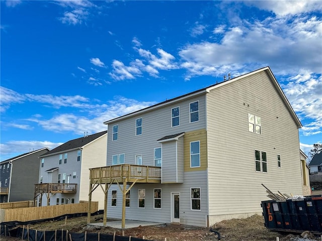 rear view of house featuring a patio