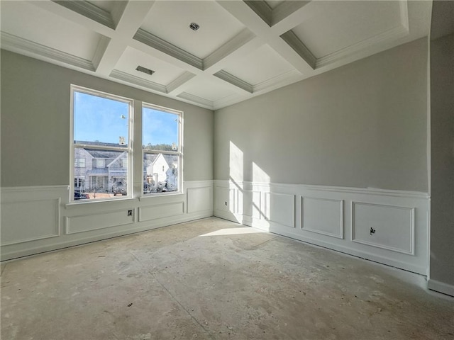 spare room with beamed ceiling and coffered ceiling