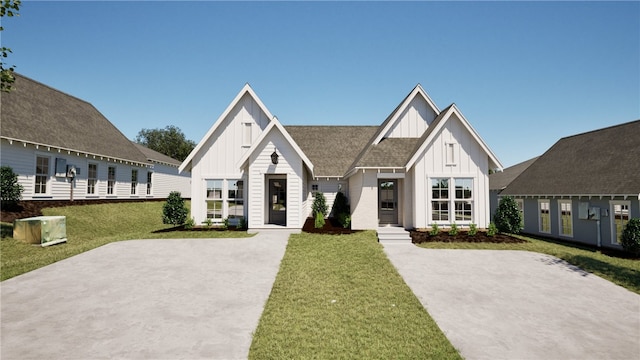 modern inspired farmhouse with a front yard