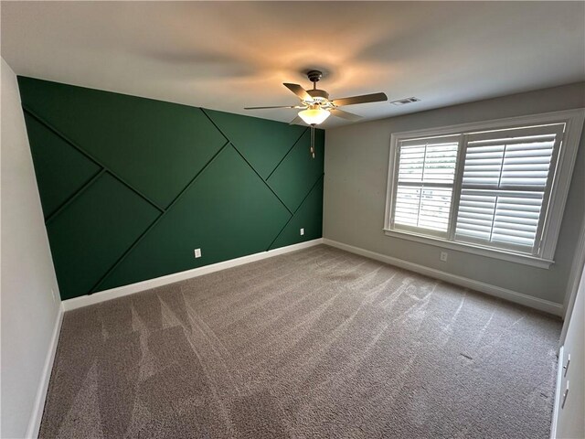 1882 Waterfall Rd, Auburn, AL 36832 - unfurnished room featuring a ceiling fan, baseboards, and light colored carpet