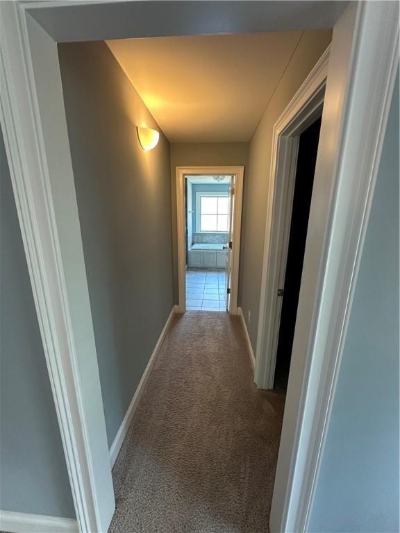 1882 Waterfall Rd, Auburn, AL 36832 - hallway featuring carpet flooring and baseboards