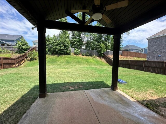 1882 Waterfall Rd, Auburn, AL 36832 - view of yard featuring a ceiling fan and a patio area