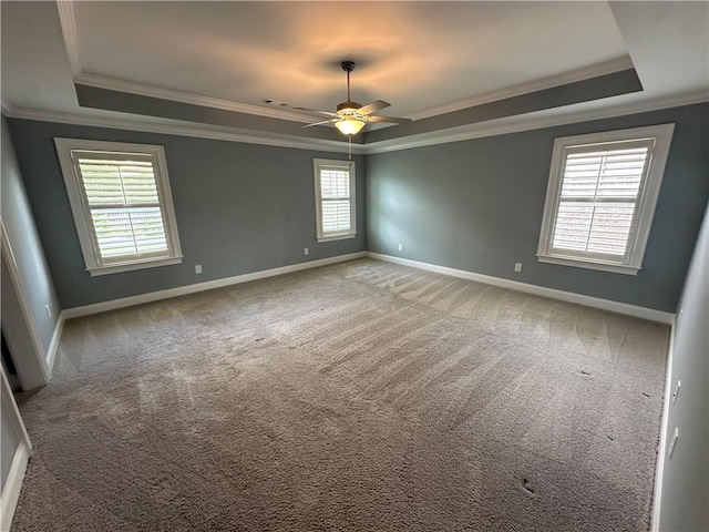 1882 Waterfall Rd, Auburn, AL 36832 - spare room with a tray ceiling, crown molding, baseboards, and carpet flooring
