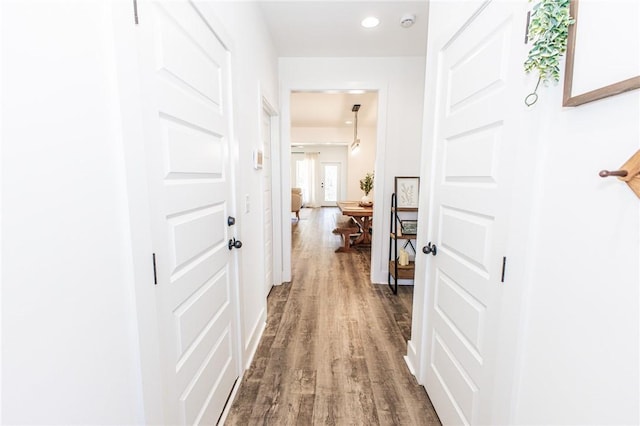 hallway featuring hardwood / wood-style floors