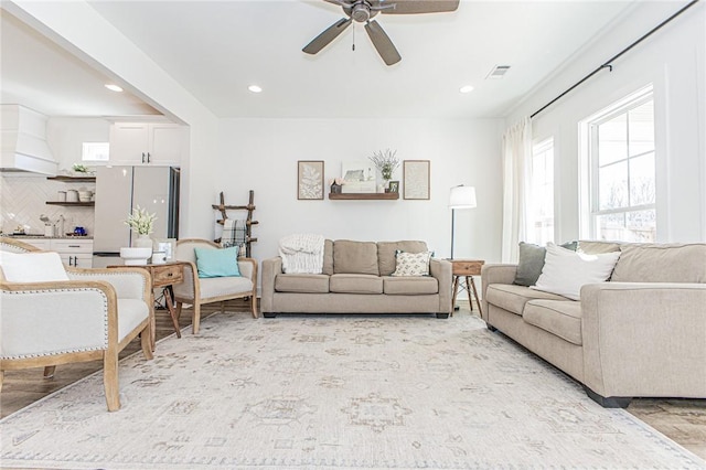 living room with ceiling fan