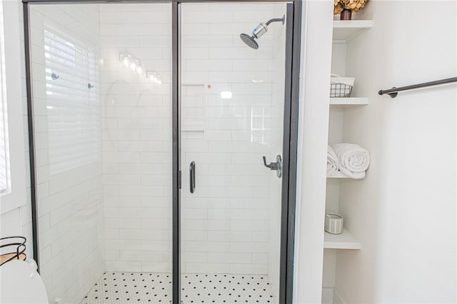 bathroom featuring walk in shower