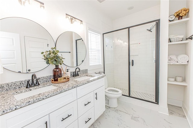 bathroom with toilet, a shower with door, and vanity