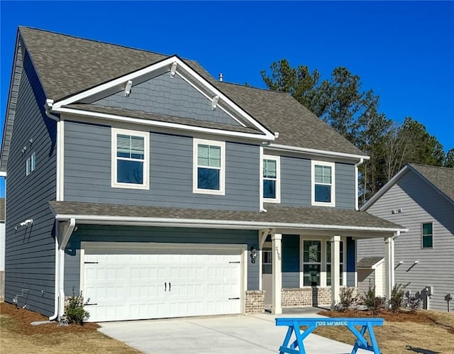 craftsman-style home with a garage and a porch