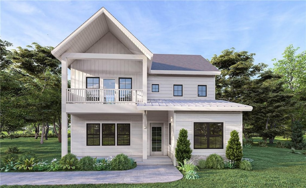 94 Cheyenne Ln, Dadeville, AL 36853 - view of front facade with a front lawn, a balcony, and metal roof