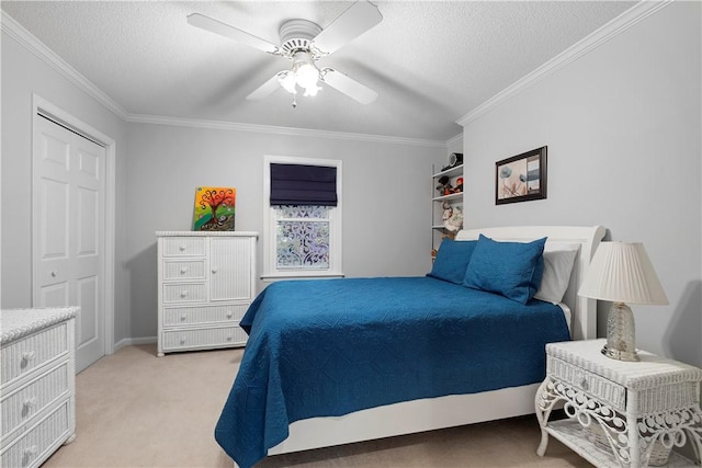 1340 Ferndale Dr, Auburn, AL 36830 - bedroom with ornamental molding, light colored carpet, a textured ceiling, and a ceiling fan