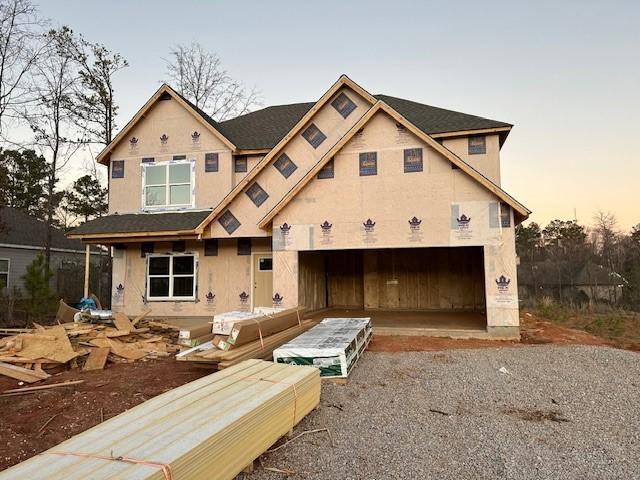 unfinished property featuring driveway