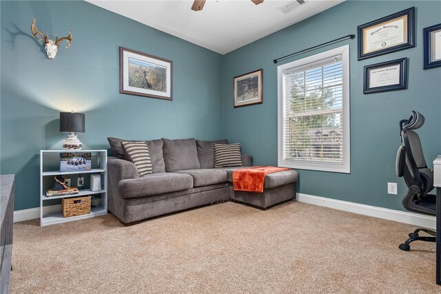 living room featuring ceiling fan and carpet floors