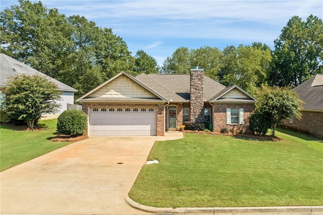 view of front facade with a garage and a front lawn