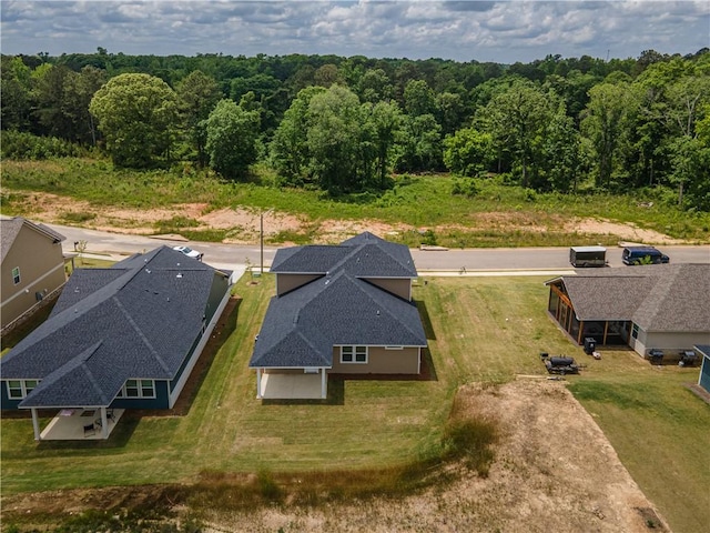 aerial view featuring a view of trees