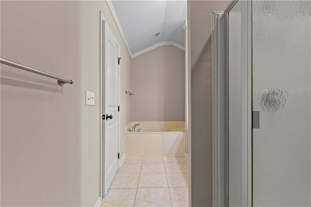 bathroom with tile patterned floors, crown molding, lofted ceiling, and shower with separate bathtub