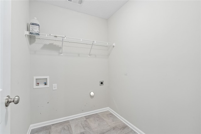 laundry room featuring washer hookup, laundry area, electric dryer hookup, and baseboards