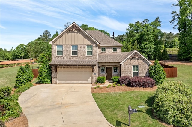 craftsman-style home with an attached garage, a front lawn, brick siding, board and batten siding, and concrete driveway