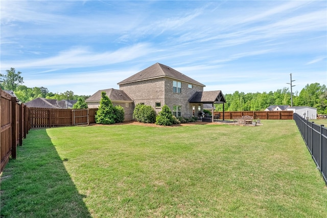 view of yard with a patio, a gazebo, and a fenced backyard