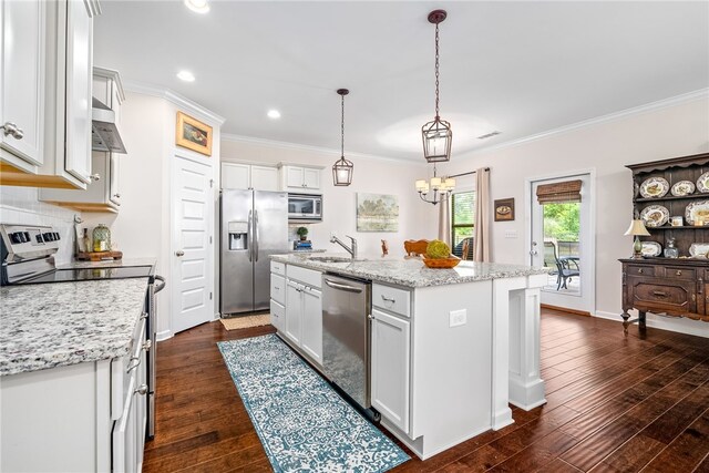 kitchen with crown molding, stainless steel appliances, dark wood finished floors, and a center island with sink