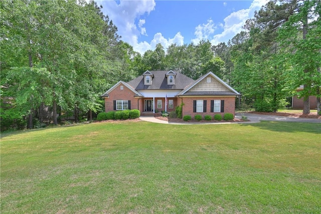 321 Saint James Dr, Auburn, AL 36830 - view of front facade with brick siding and a front lawn