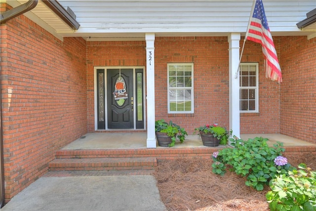 321 Saint James Dr, Auburn, AL 36830 - view of exterior entry featuring a porch and brick siding
