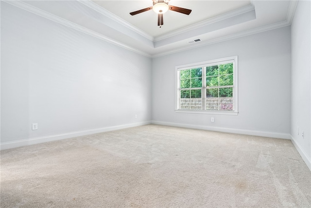 3000 Alumni Ln, Opelika, AL 36804 - unfurnished room featuring crown molding, ceiling fan, light colored carpet, a tray ceiling, and baseboards