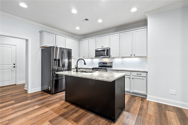 3000 Alumni Ln, Opelika, AL 36804 - kitchen featuring stainless steel appliances, a sink, baseboards, ornamental molding, and light stone counters
