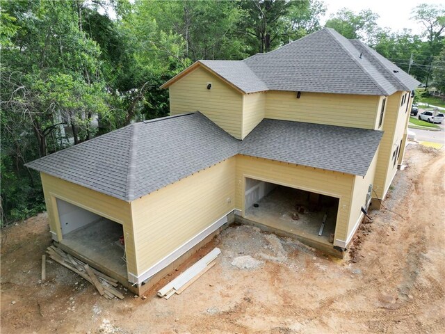 410 Geneva St, Opelika, AL 36801 - view of property exterior with roof with shingles
