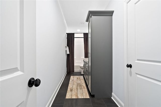 2051 Moores Mill Rd Unit K, Auburn, AL 36830 - hall with crown molding and dark tile patterned floors