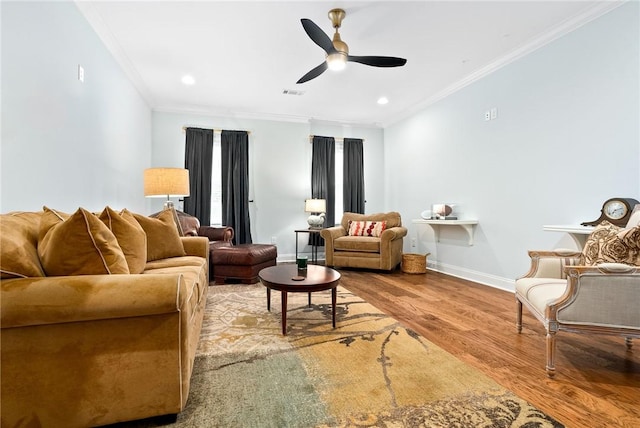 2051 Moores Mill Rd Unit K, Auburn, AL 36830 - living area featuring wood finished floors, ornamental molding, ceiling fan, and recessed lighting
