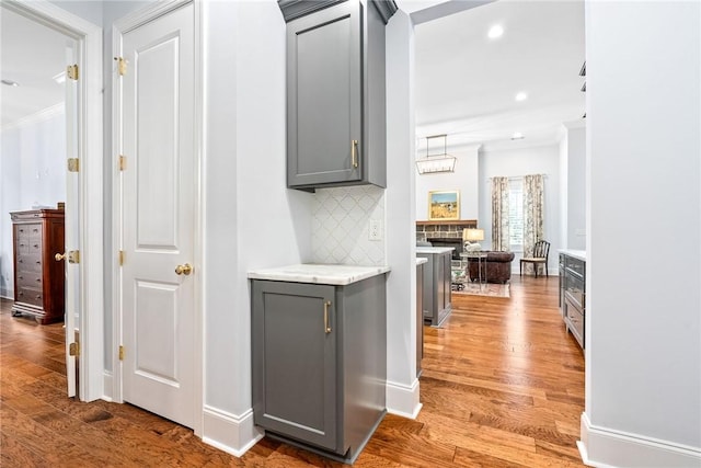 2051 Moores Mill Rd Unit K, Auburn, AL 36830 - corridor with wood finished floors, crown molding, and recessed lighting