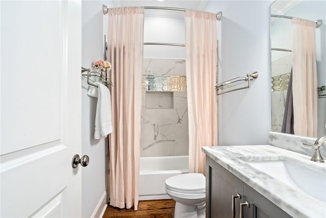 2051 Moores Mill Rd Unit K, Auburn, AL 36830 - bathroom featuring vanity, shower / bath combo with shower curtain, and wood finished floors