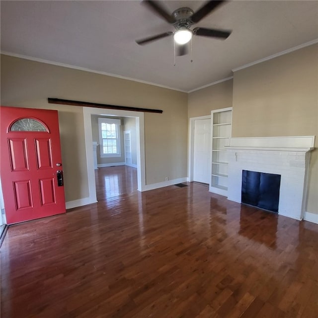 unfurnished living room with dark hardwood / wood-style floors, ceiling fan, and crown molding