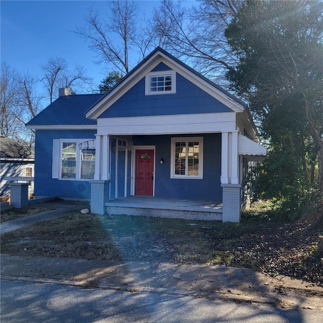 bungalow-style home with a porch