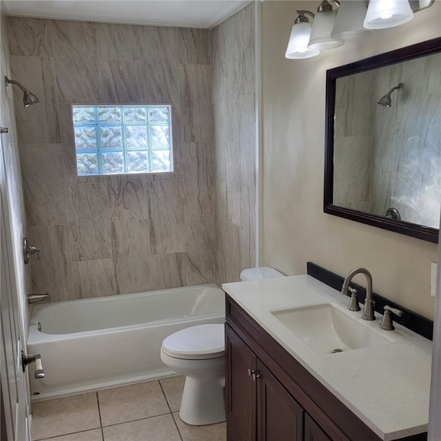 full bathroom featuring toilet, tile patterned flooring, vanity, and tiled shower / bath