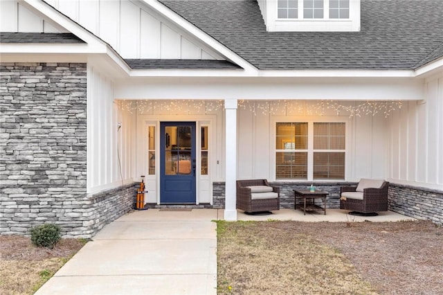 property entrance with outdoor lounge area and a patio