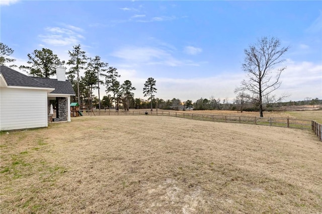 view of yard featuring a rural view