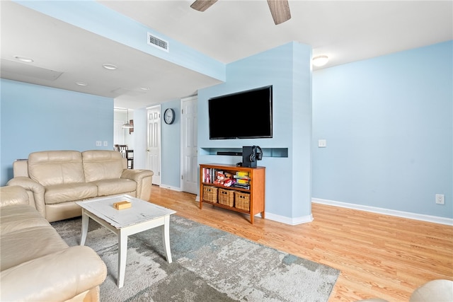 1761 Wire Rd Unit 411, Auburn, AL 26832 - living room with ceiling fan, wood finished floors, and baseboards
