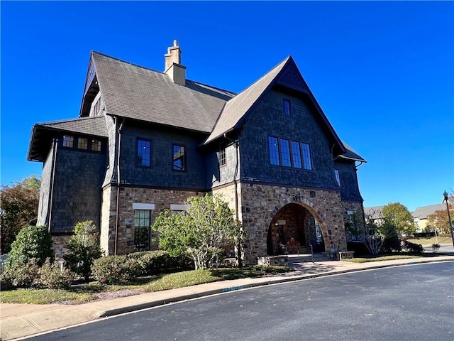 650 Dekalb St Unit 2213, Auburn, AL 36830 - view of front of house featuring a chimney and roof with shingles