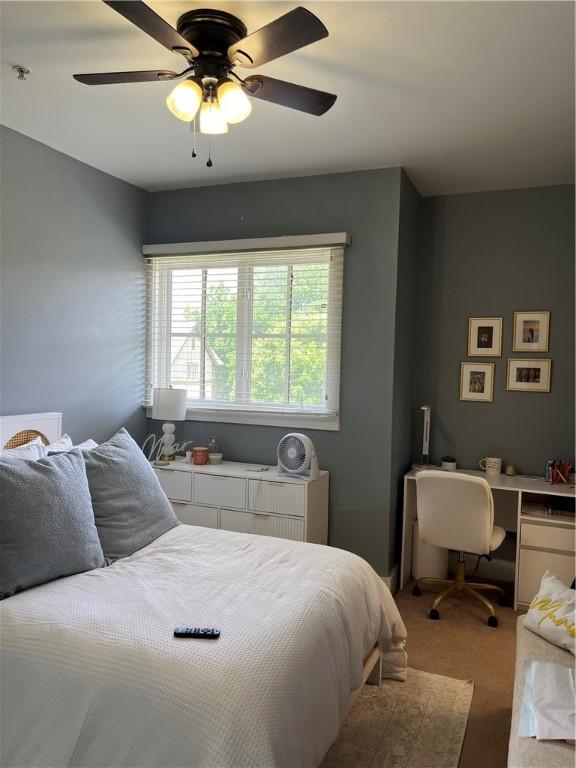 650 Dekalb St Unit 2213, Auburn, AL 36830 - carpeted bedroom with an office area and a ceiling fan
