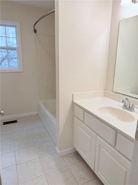 460 Waverly Rd, Auburn, AL 36832 - full bath featuring vanity, tile patterned flooring, and  shower combination